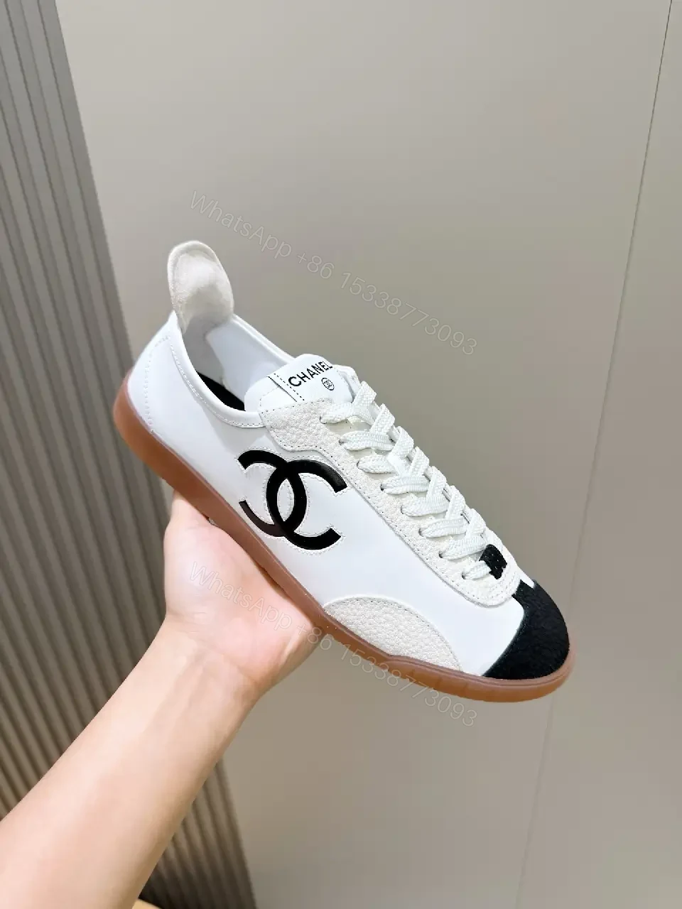 View 9 of White Leather Sneaker Black Toe Classic Chanel Logo Shoes