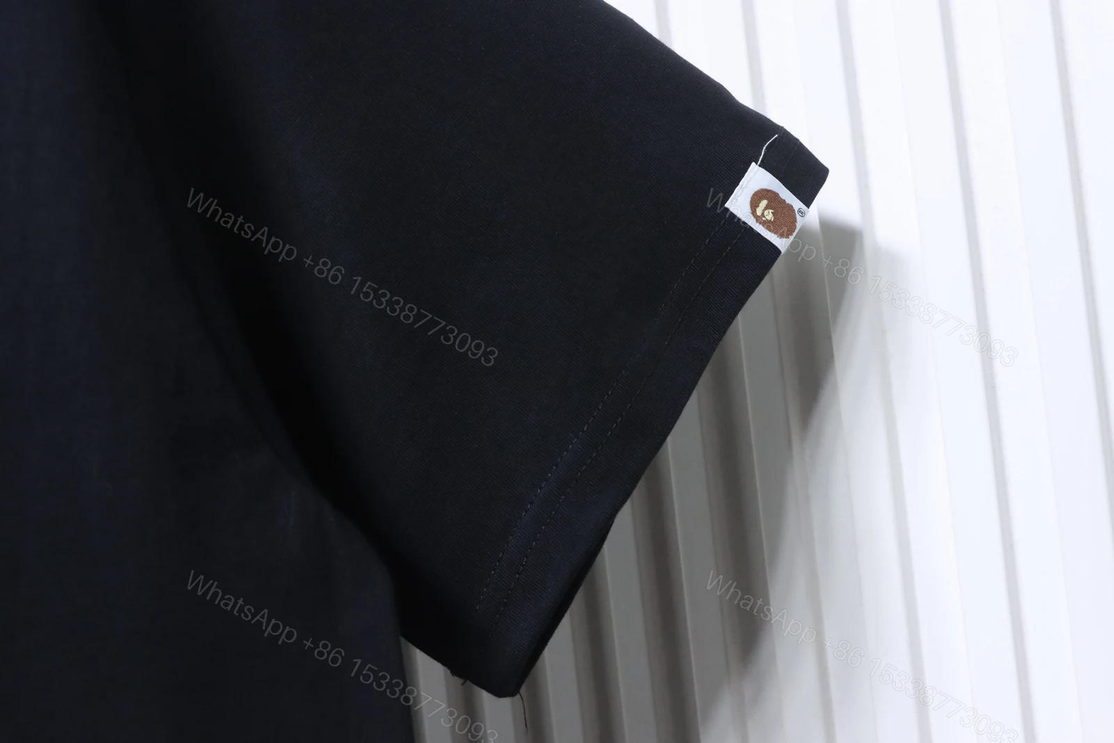 View 4 of BAPE check-pattern ape head letter print short-sleeved T-shirt in black