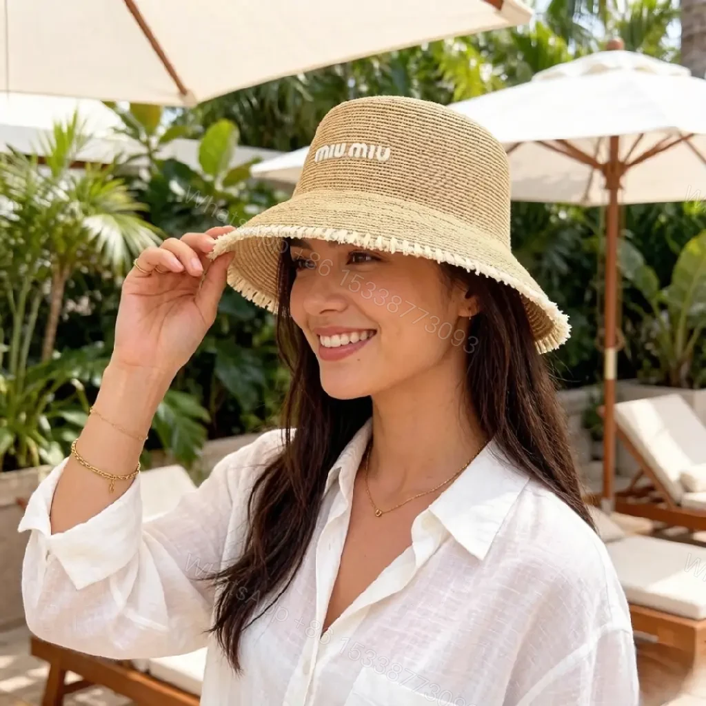 View 2 of Natural Straw Bucket Hat with Subtle Logo Detail