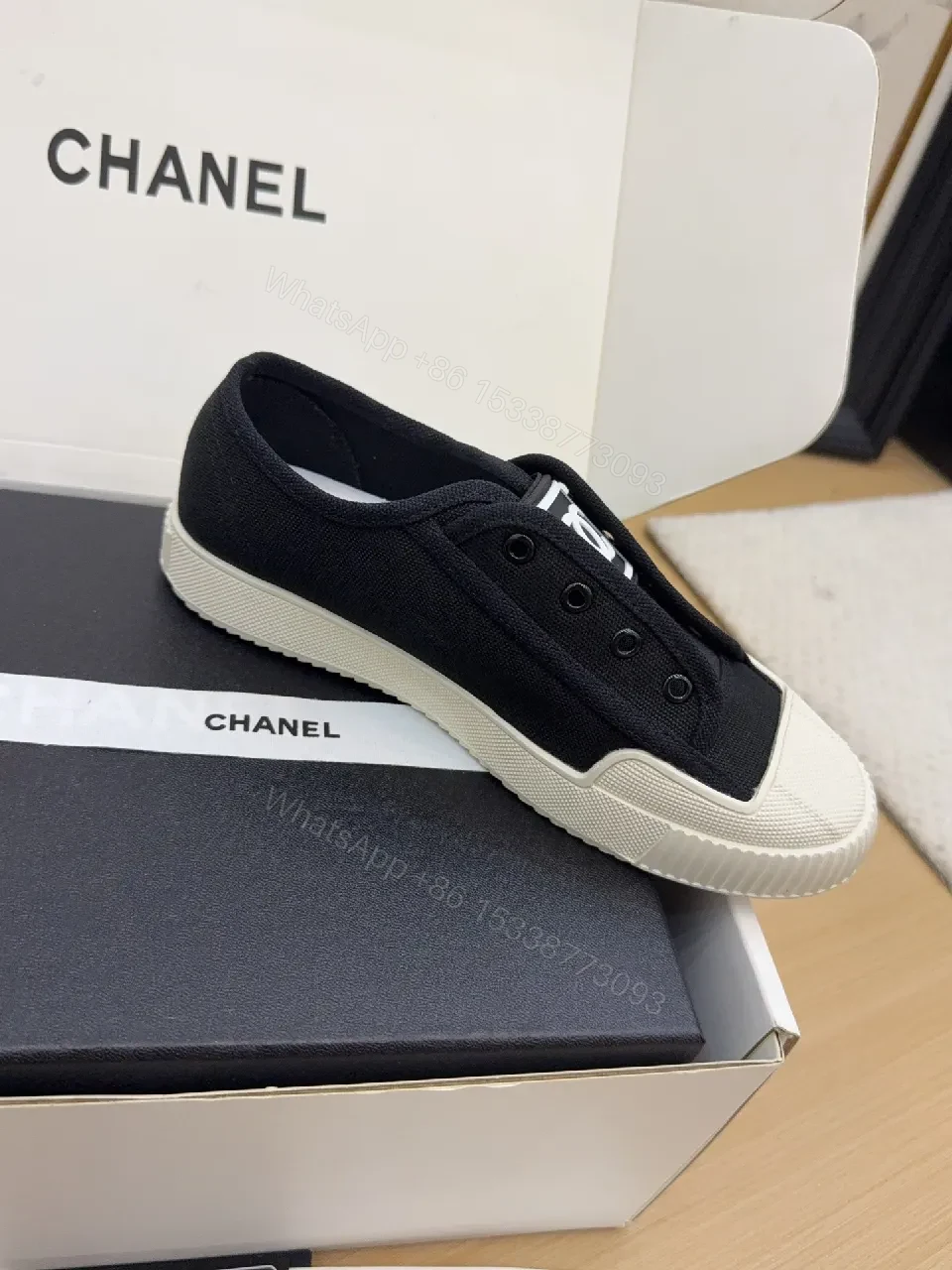 View 2 of Minimalist Black Canvas Sneakers with Logo Strap