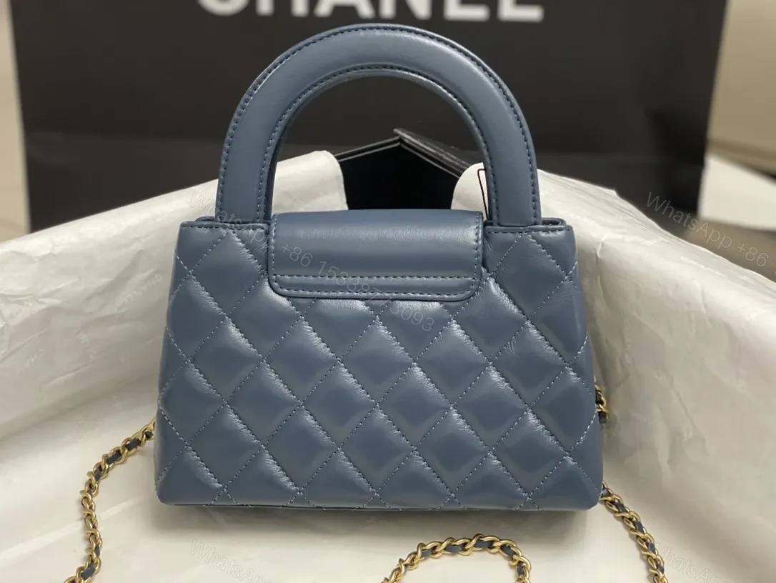 View 3 of Blue Quilted Mini Bag: Structured Luxury, Gold Hardware