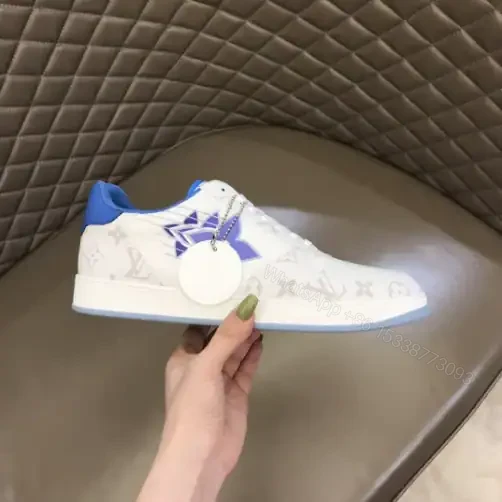 View 2 of LOUIS VUITTON RIVOLI SNEAKERS IN WHITE CALF LEATHER AND MONOGRAM CANVAS – LSVT367