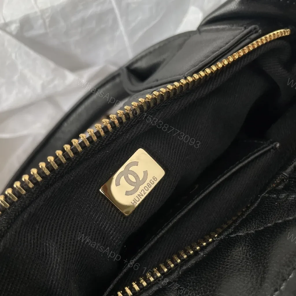 View 7 of Quilted Black Leather Handbag with Gold Hardware - Chic Style
