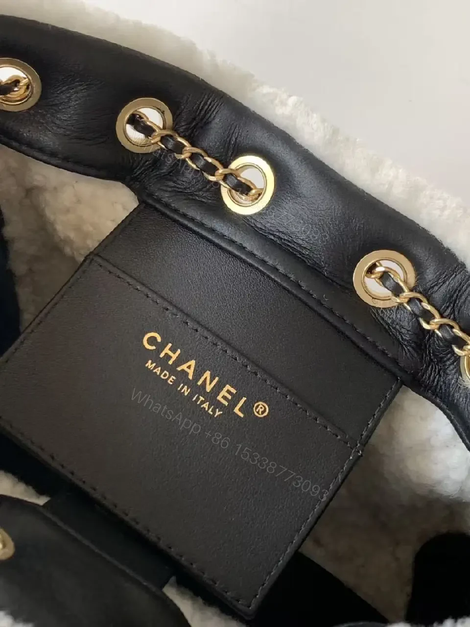 View 9 of Quilted Mini Bag with Faux Shearling Trim - Compact Luxury