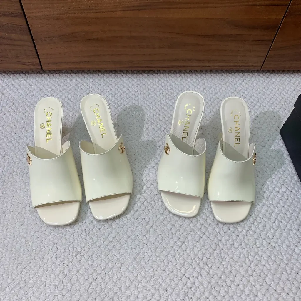 View 5 of Cream Leather Slide Sandals, Pearl White, Chanel Logo, Midsize Heel Mules