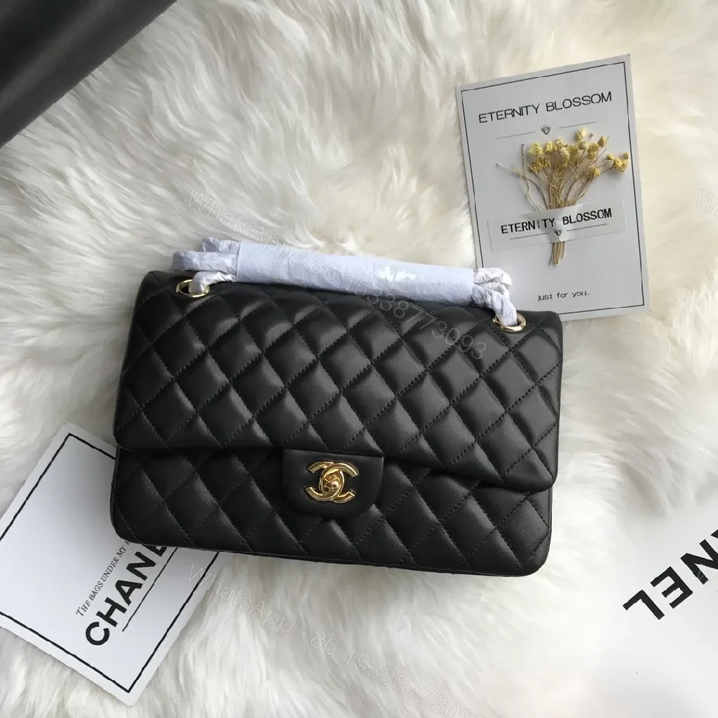 View 7 of Quilted Black Handbag with Gold Clasp – Luxe Chic Style