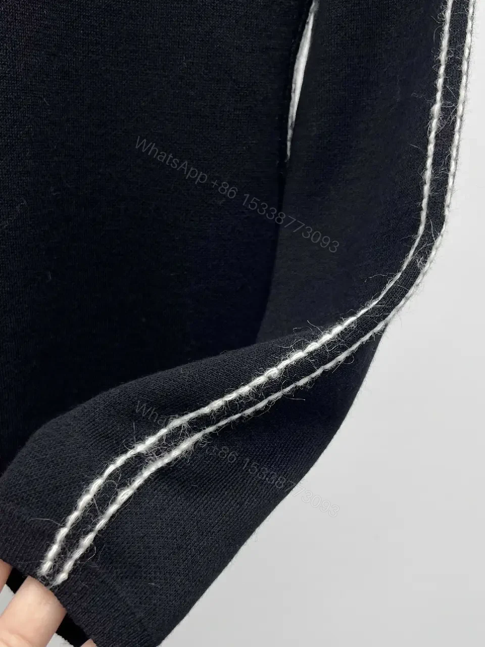 View 5 of Elegant Knit Turtleneck with Signature Embroidery, Black Knit Dishive