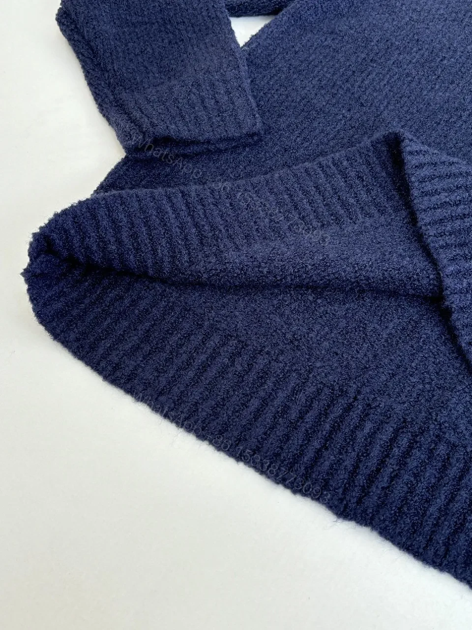 View 2 of Blue Knit Luxury Sweater with Signature Monogram Emblem