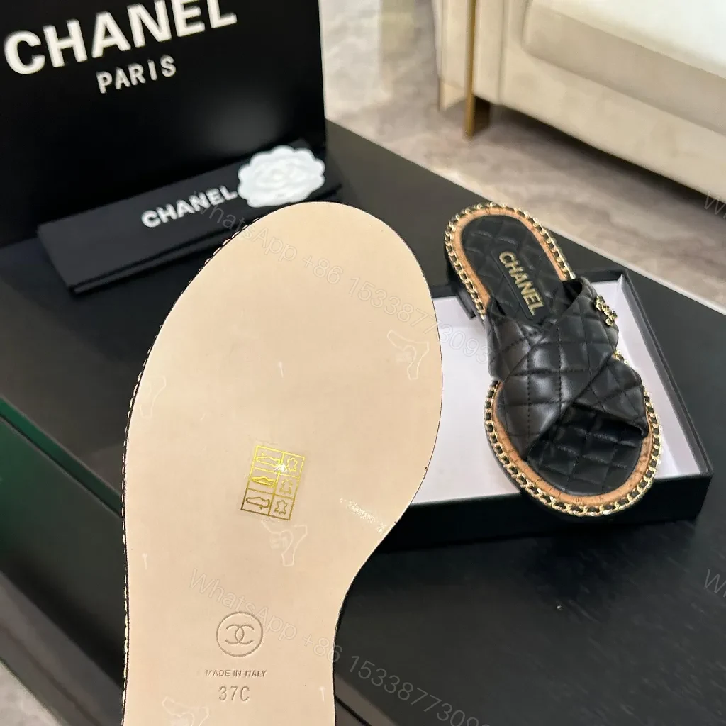 View 3 of Black Quilted Slip-Ons with Chain Trim: Elevated Comfort