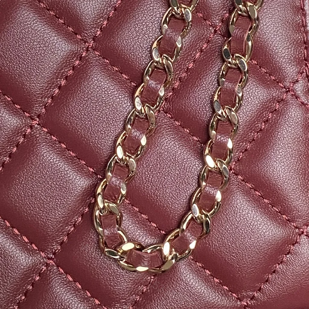 View 9 of Quilted Burgundy Leather Mini Bag - Chain Strap, Gold Hardware