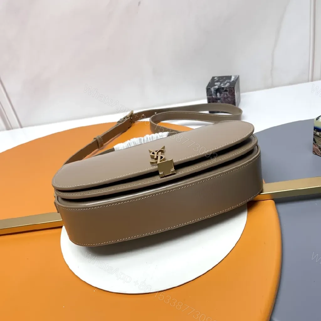 View 7 of Taupe Leather Saddle Bag with Subtle Designer Hardware