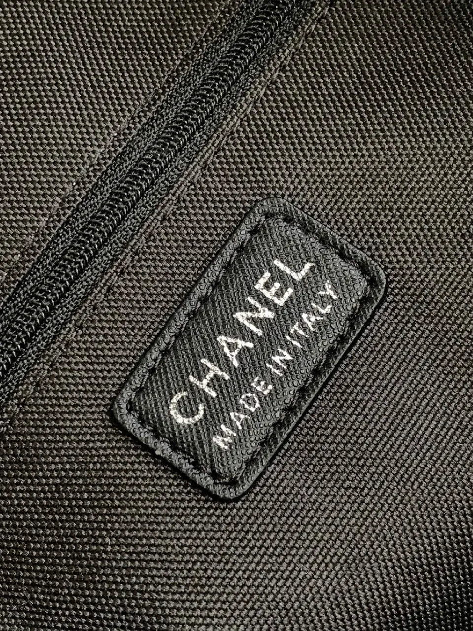 View 8 of Structured Black Travel Bag: Matte, Signature Emblem, All-Day Ready
