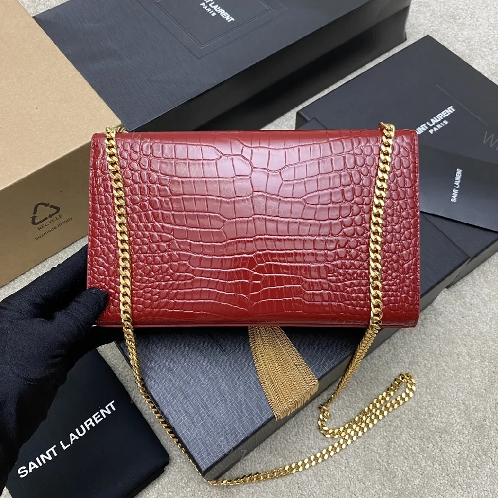 View 9 of Structured Red Leather Clutch with Gold Hardware and Tassel