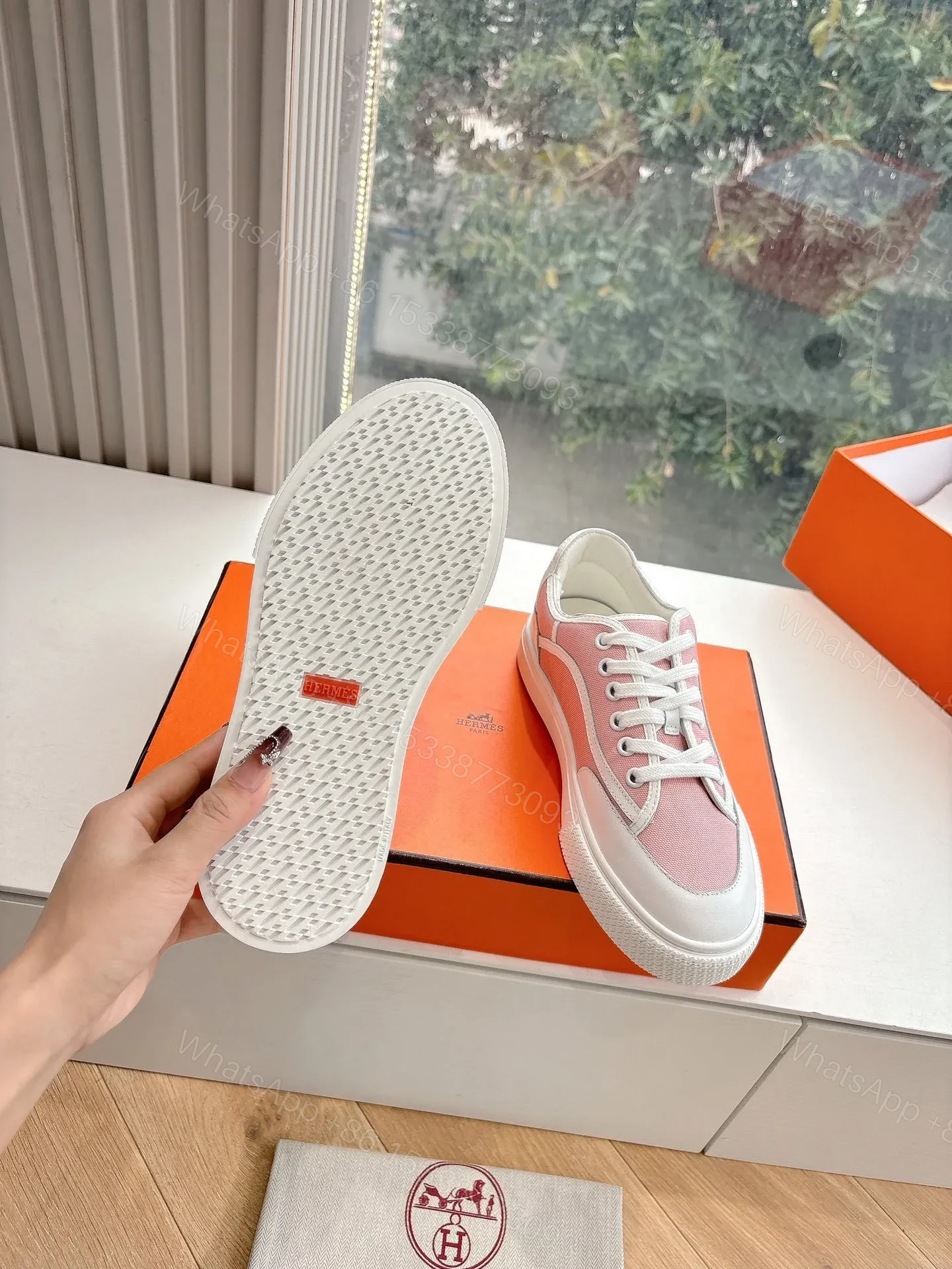 View 2 of Hermes Women Pink Canvas And White Leather Sneakers