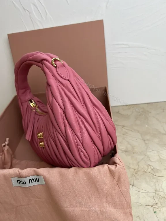 View 6 of Pink Quilted Miu Miu Mini Bag â€“ Luxury Everyday Chic