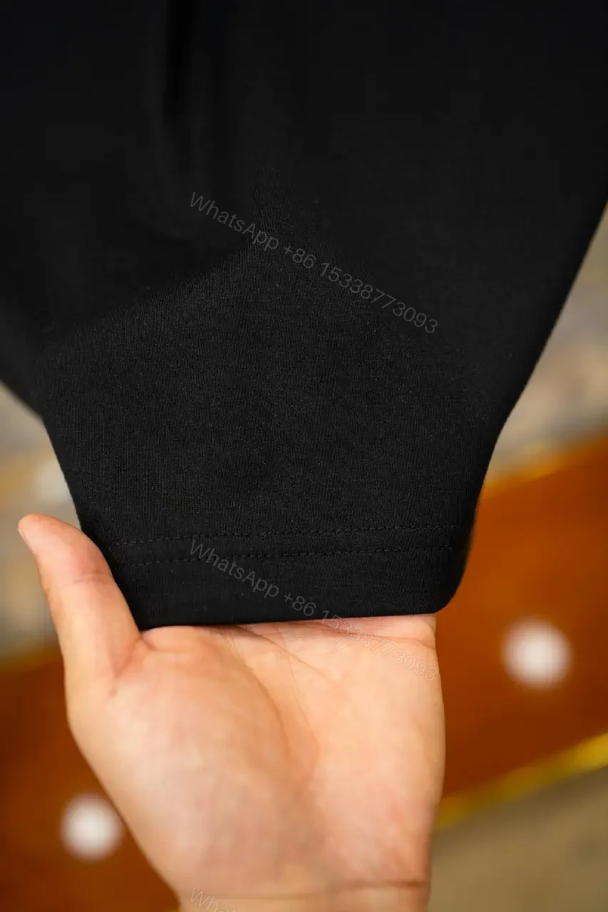 View 9 of Black Cotton T-Shirt with Logo Patch, Classic Style, Everyday Wear