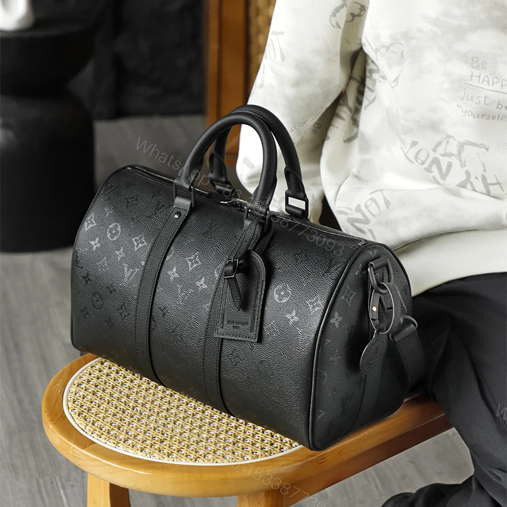 View 27 of 高仿LV*Keepall35系列M28370男士單肩包免檢版