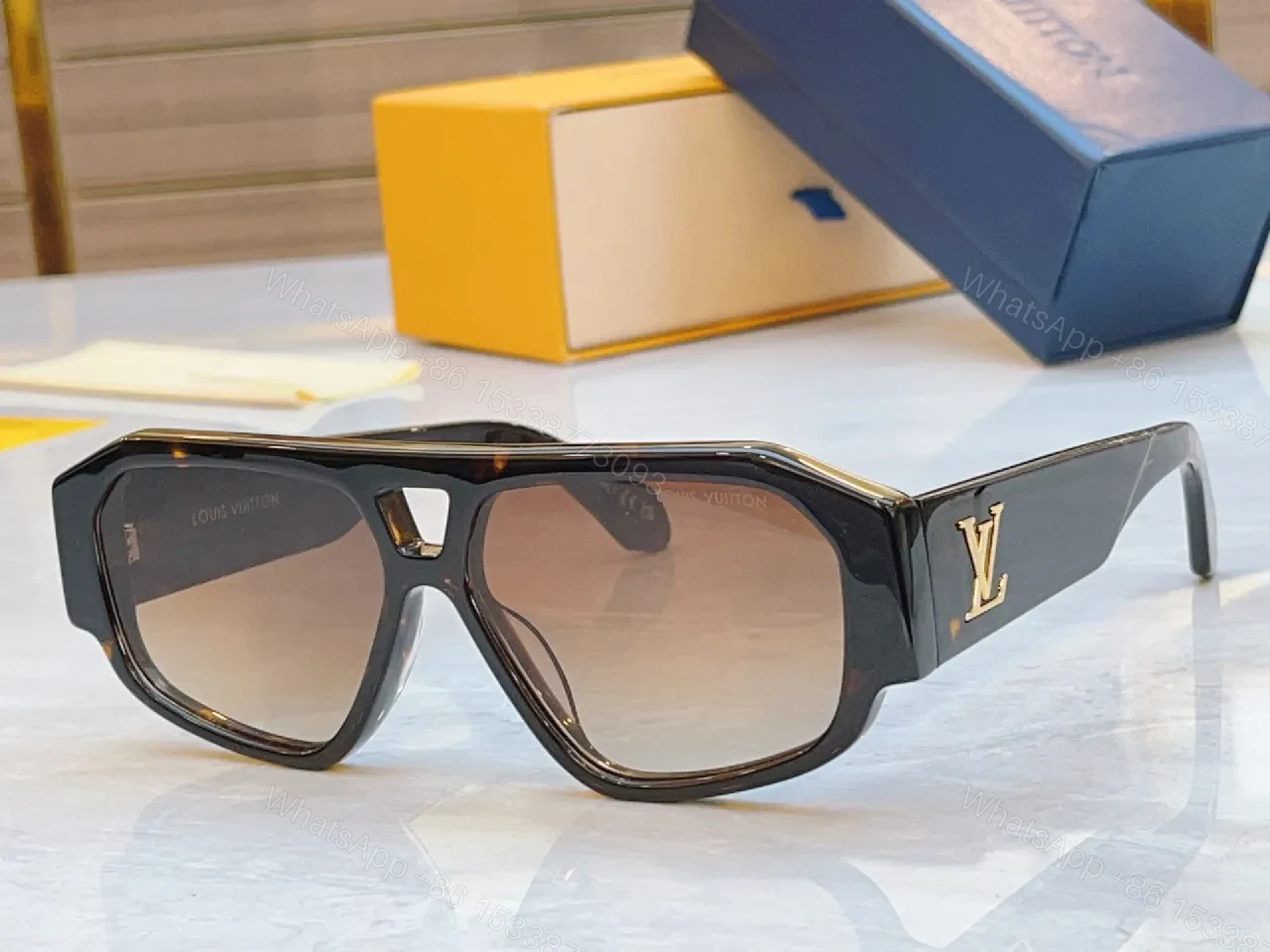 View 2 of Translucent Luxe Sunglasses: Signature Designer-Detailed Eyewear