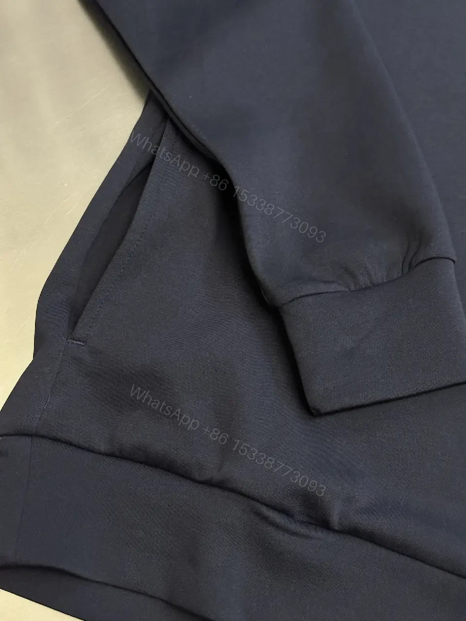 View 4 of navy cotton blend half-zip pullover with chest pocket for everyday luxury