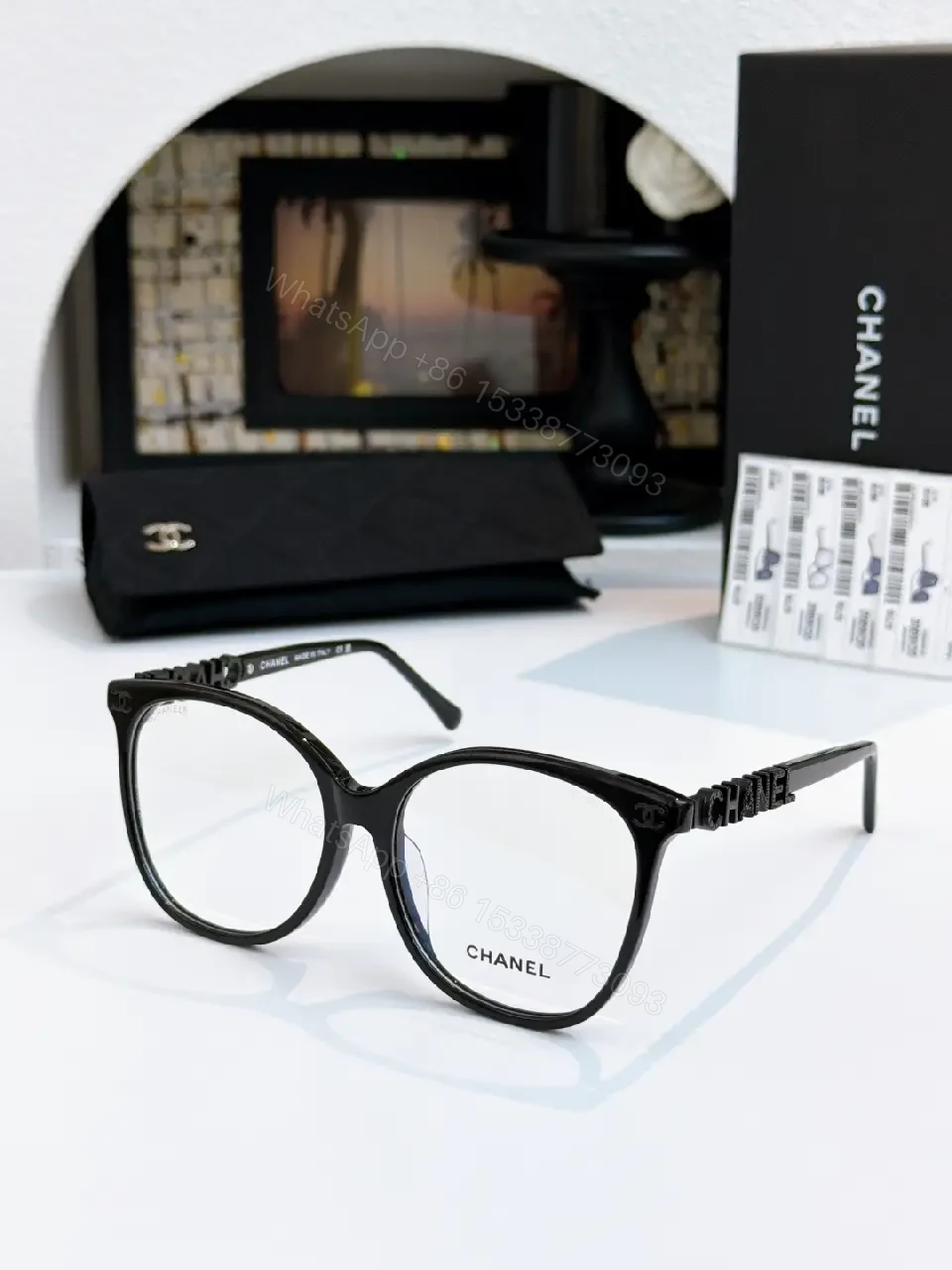 View 10 of Black Thick-Rim Glasses, Square Full-R Rim, Sculpted Bridge, Ribbed Arms, Chanel Detailing