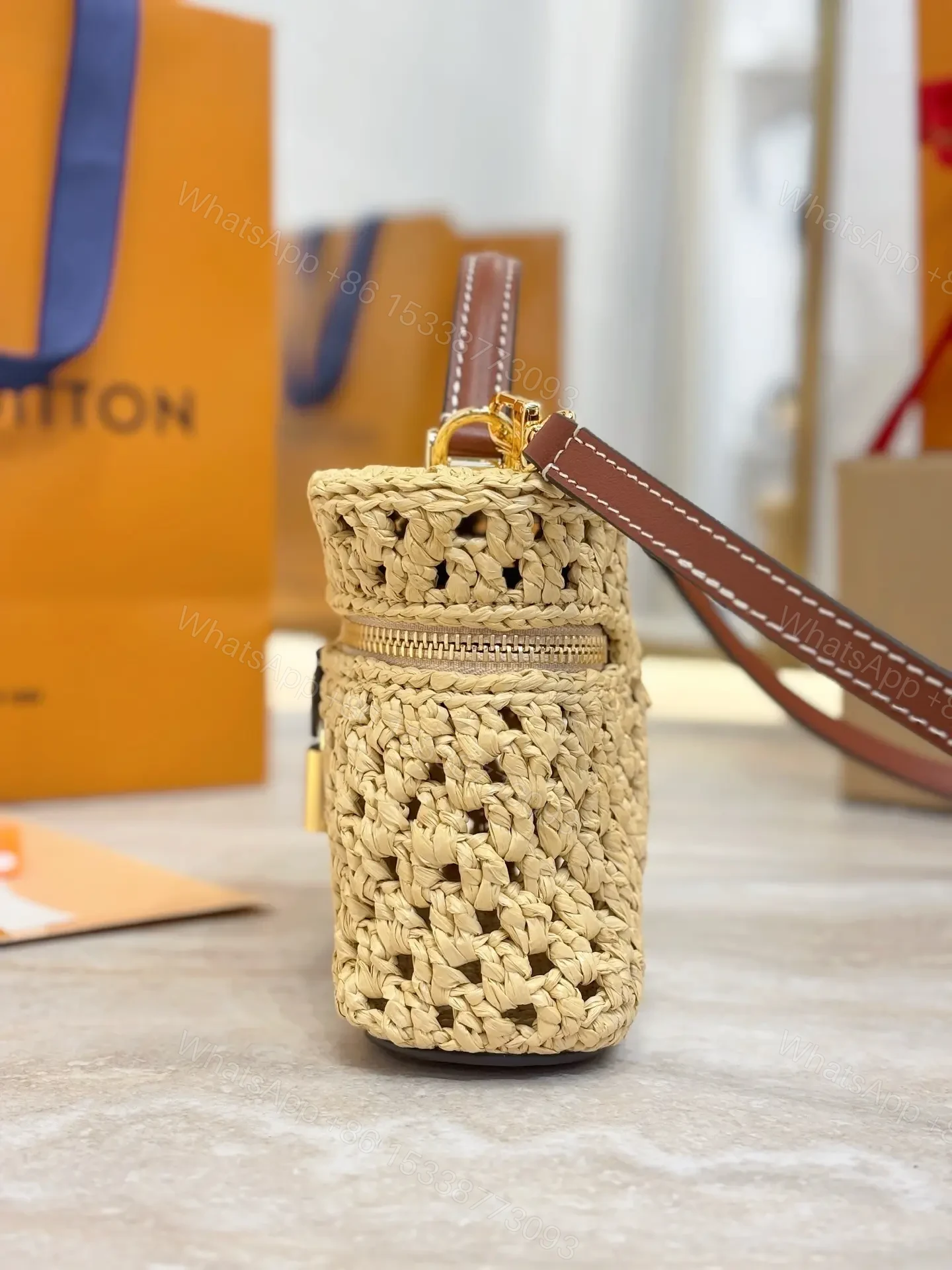 View 3 of Louis Vuitton Vanity Chain Pouch in raffia