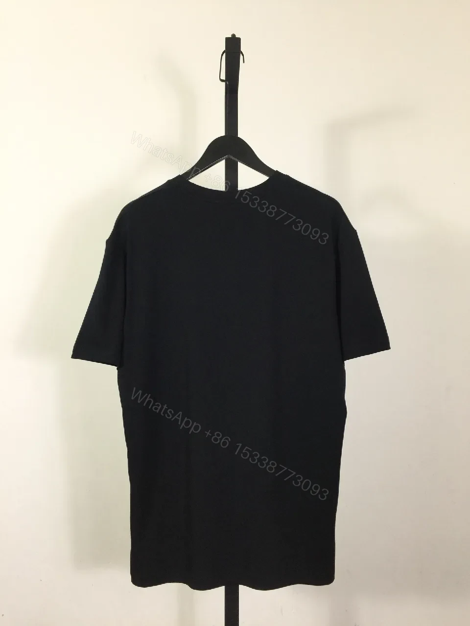 View 3 of Black Cotton Tee | Graphic Luxe Logo, Relaxed Fit, Durable