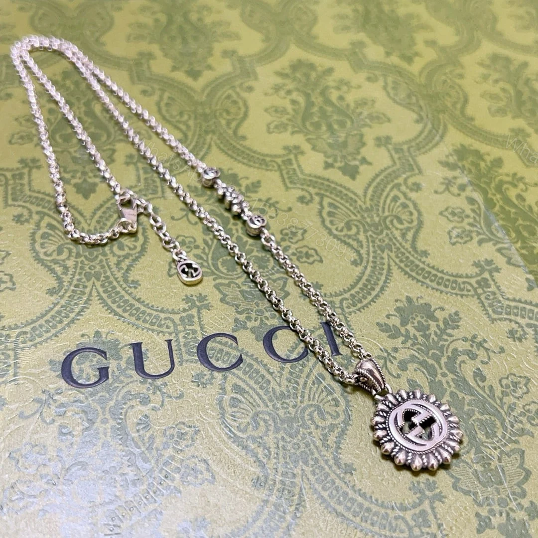 View 2 of GUCCI INTERLOCKING G LOGO EMBELLISHED PENDANT STATION NECKLACE GOLD TONE