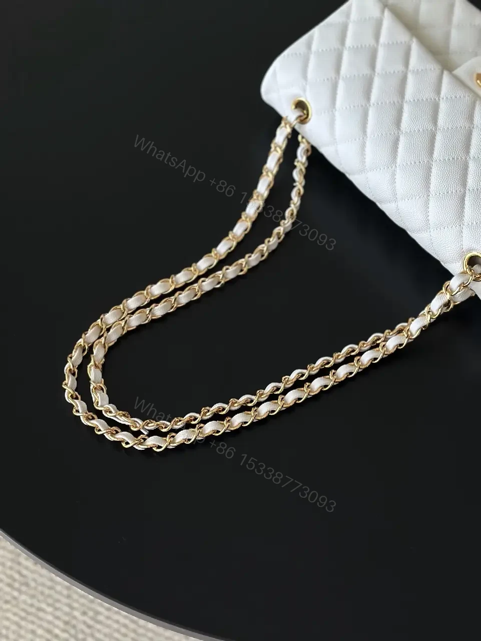 View 3 of Grey quilted leather chain-strap shoulder bag, luxury monogram-inspired pattern for everyday elegance