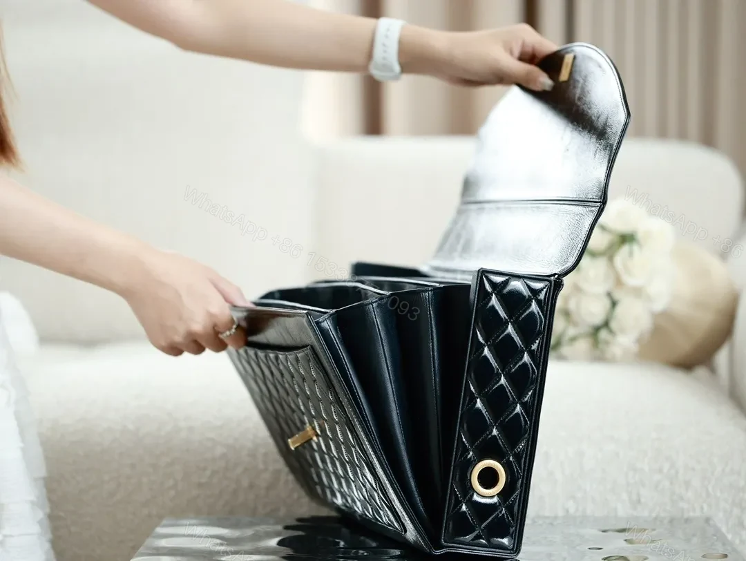 View 6 of Compact Quilted Leather Handbag with Gold Hardware
