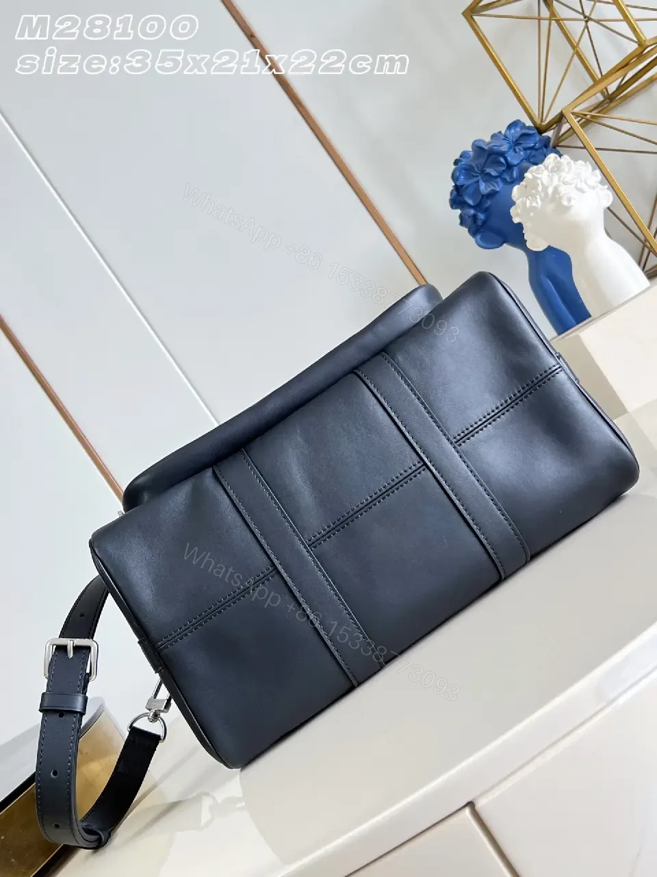View 6 of Black leather structured satchel with top handle, removable strap, smooth finish, Louis Vuitton Paris (no brand details)