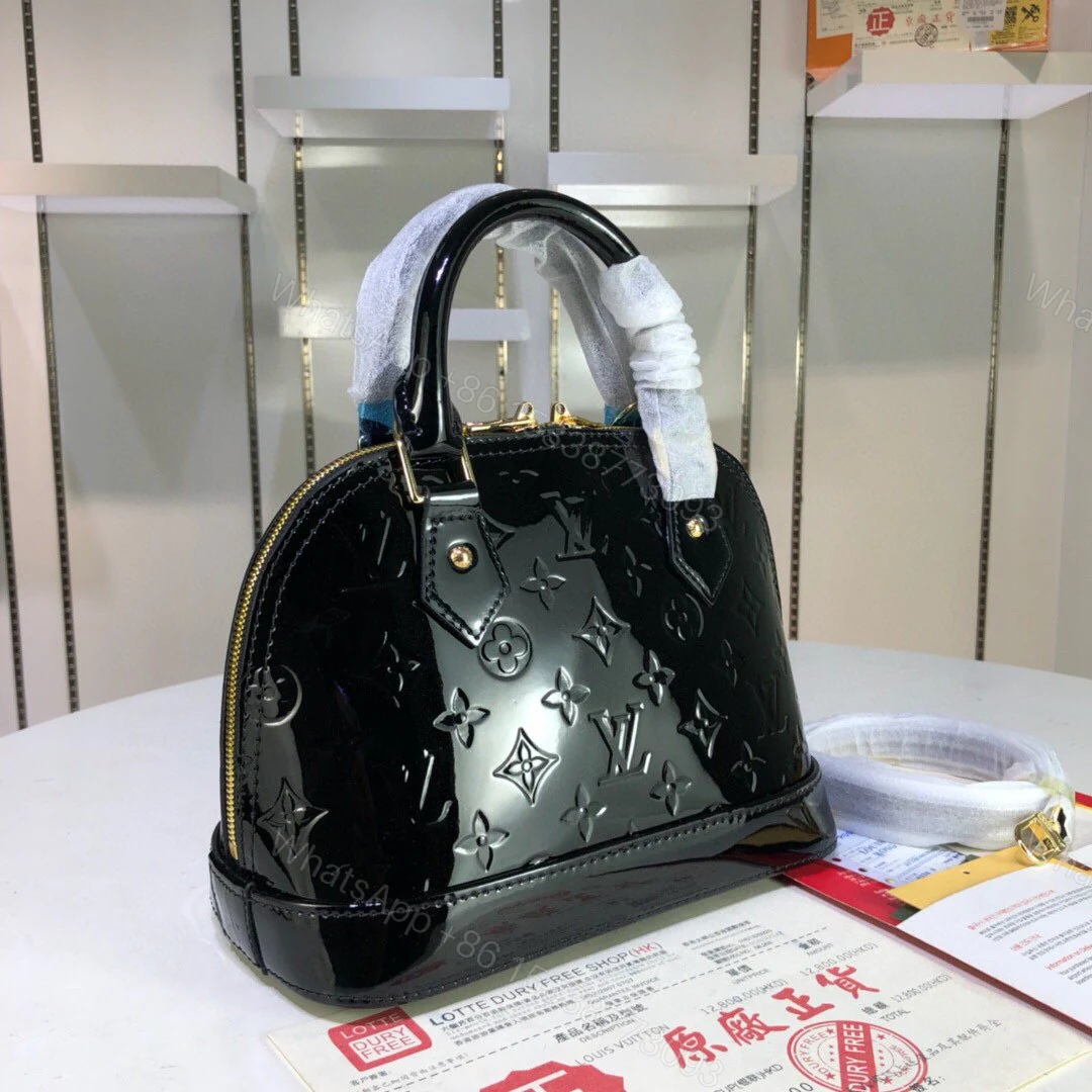 View 23 of Louis Vuitton Alma