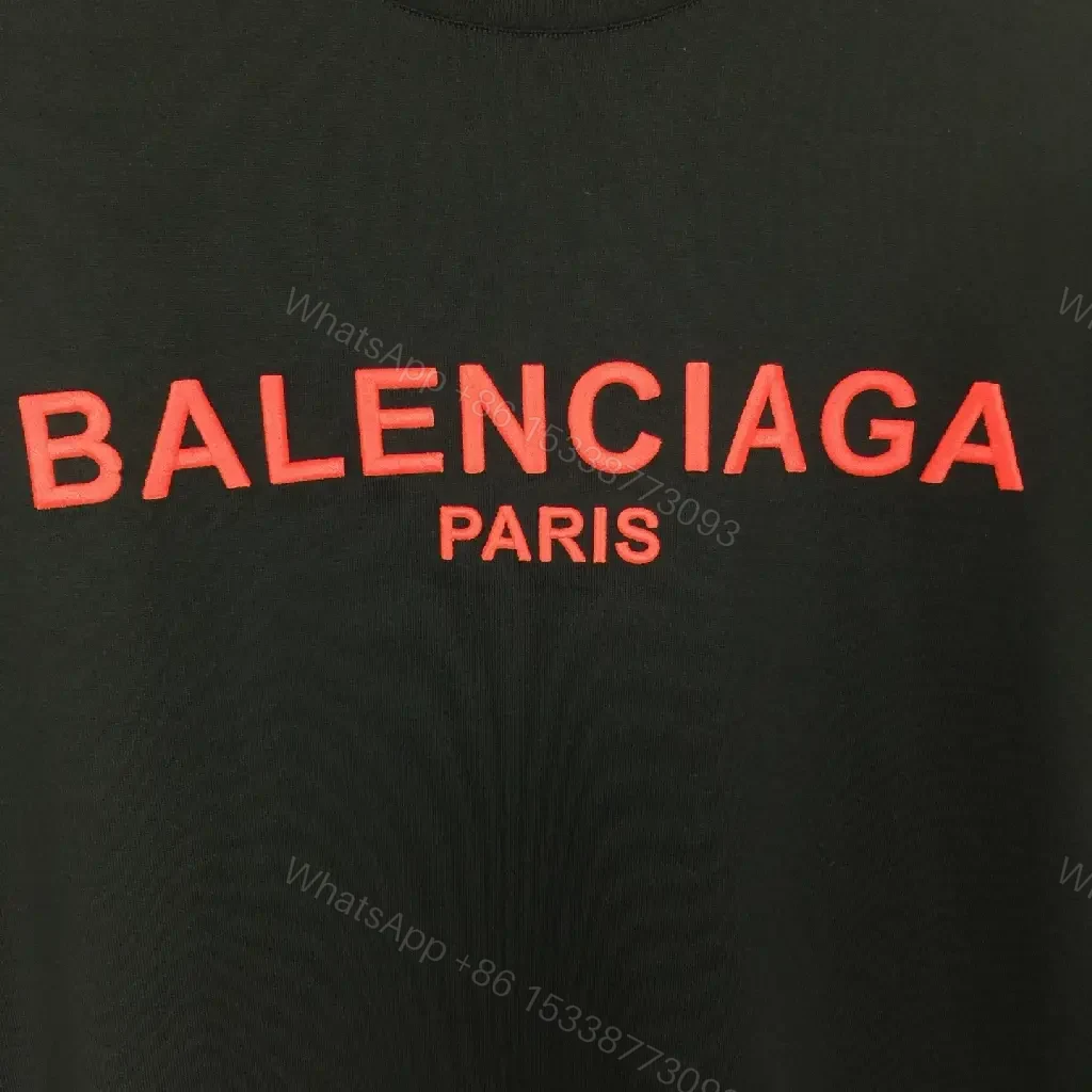 View 8 of Black Cotton Tee — Elevated Streetwear Logo Tee