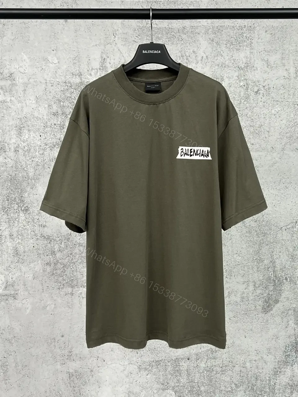 View 8 of Olive Cotton Patch Tee: Relaxed, Street-Ready Comfort