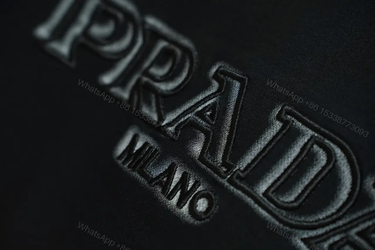 View 2 of black cotton logo-embossed T-shirt for everyday luxury
