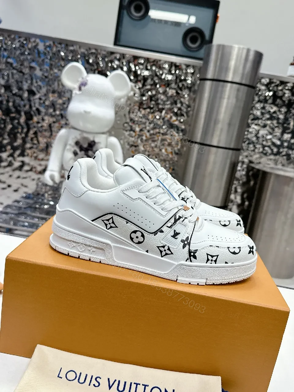 View 7 of White Leather Sneaker, Monogram Motif, Luxe Street Style, Designer Flair, Sneaker