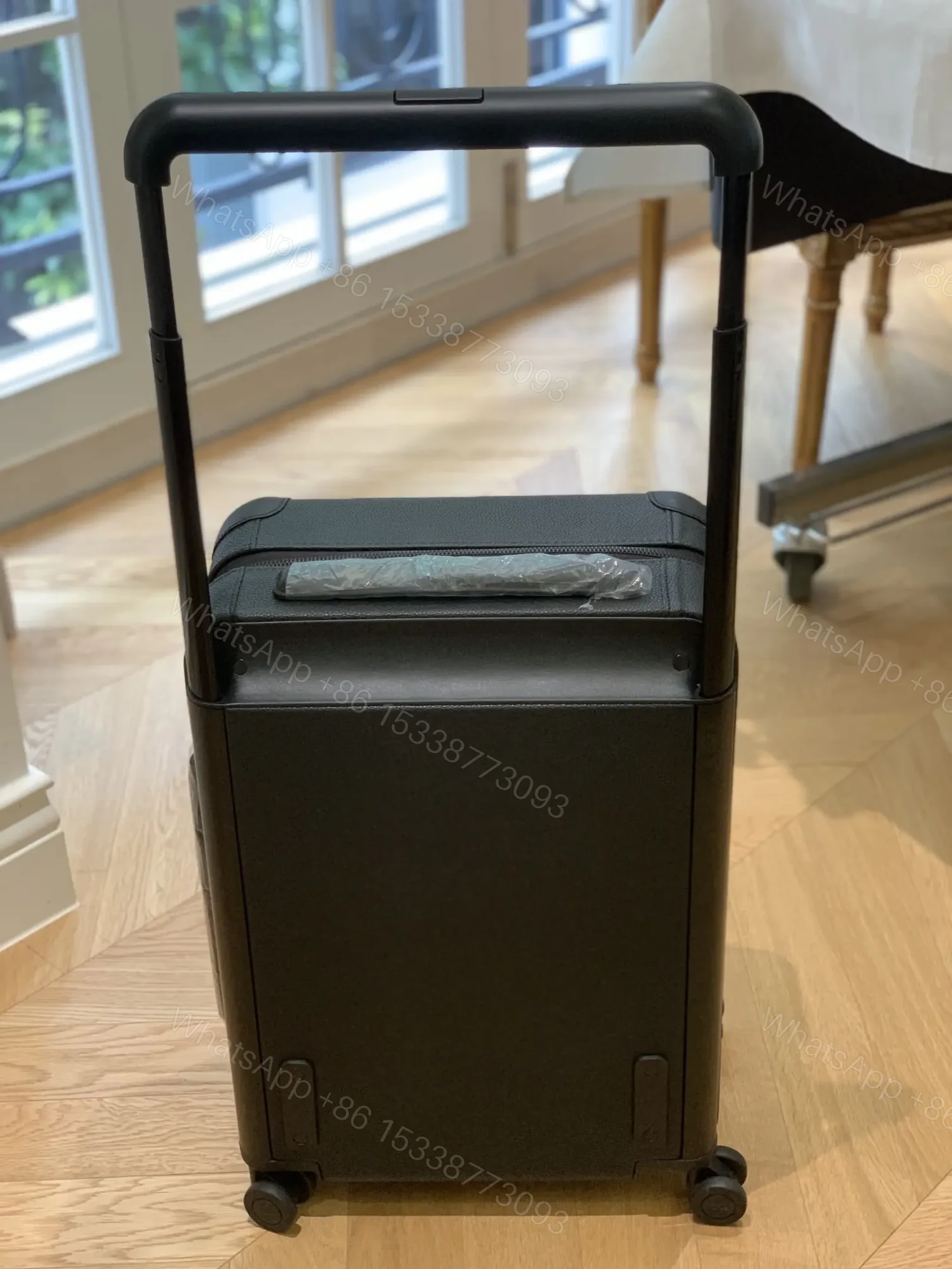 View 3 of Louis Vuitton Horizon 55 rolling suitcase in Black