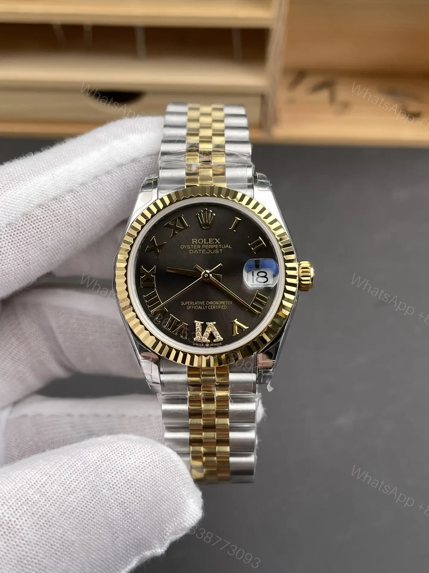 Rolex Datejust 31 Stainless Steel Yellow Gold Fluted Grey – Roman Jubilee 278273-0018 — view 1
