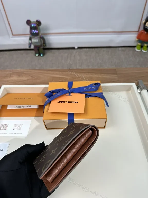 View 9 of Monogram Leather Wallet: Classic Louis Vuitton Bi-Fold, Slim Profile