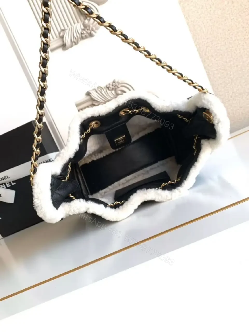 View 3 of Quilted Mini Bag with Faux Shearling Trim - Compact Luxury