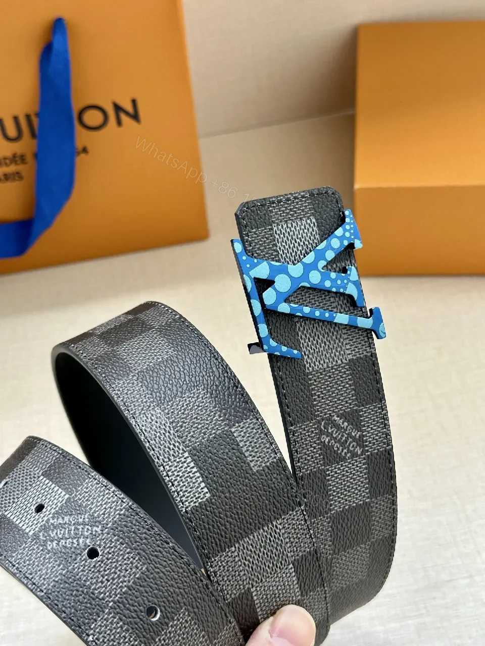 View 4 of Bold Checker Belt with Blue Buckle — Modern Luxury Accessory