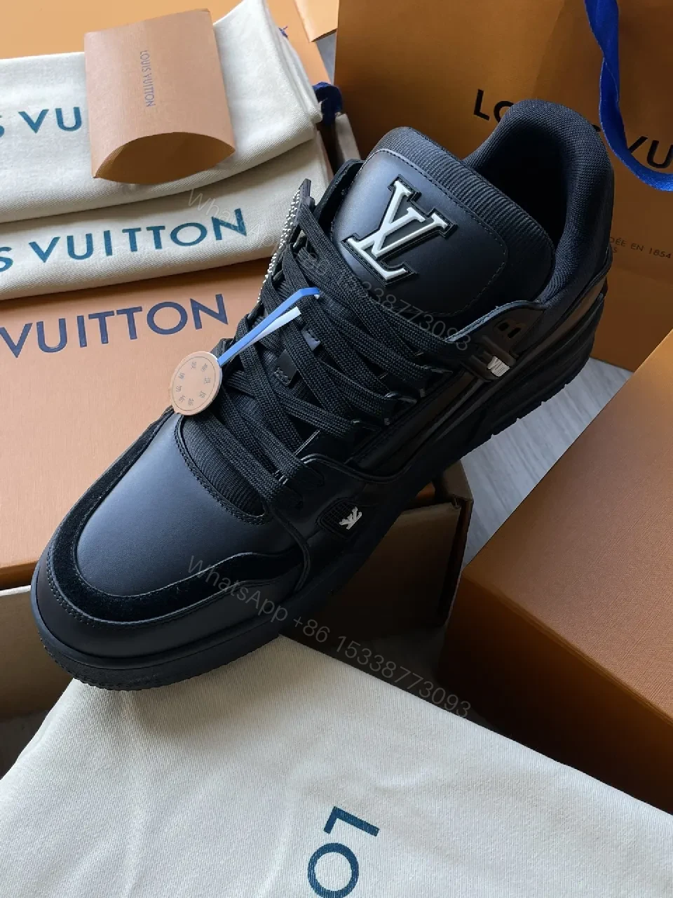 View 8 of Black Leather High‐Top Sneakers with LV Embellishments