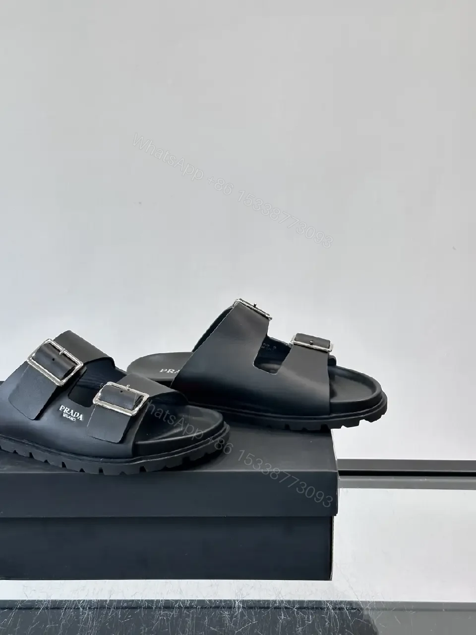 View 10 of Black Leather Double-Buckle Sandals — Prada Style Sliders