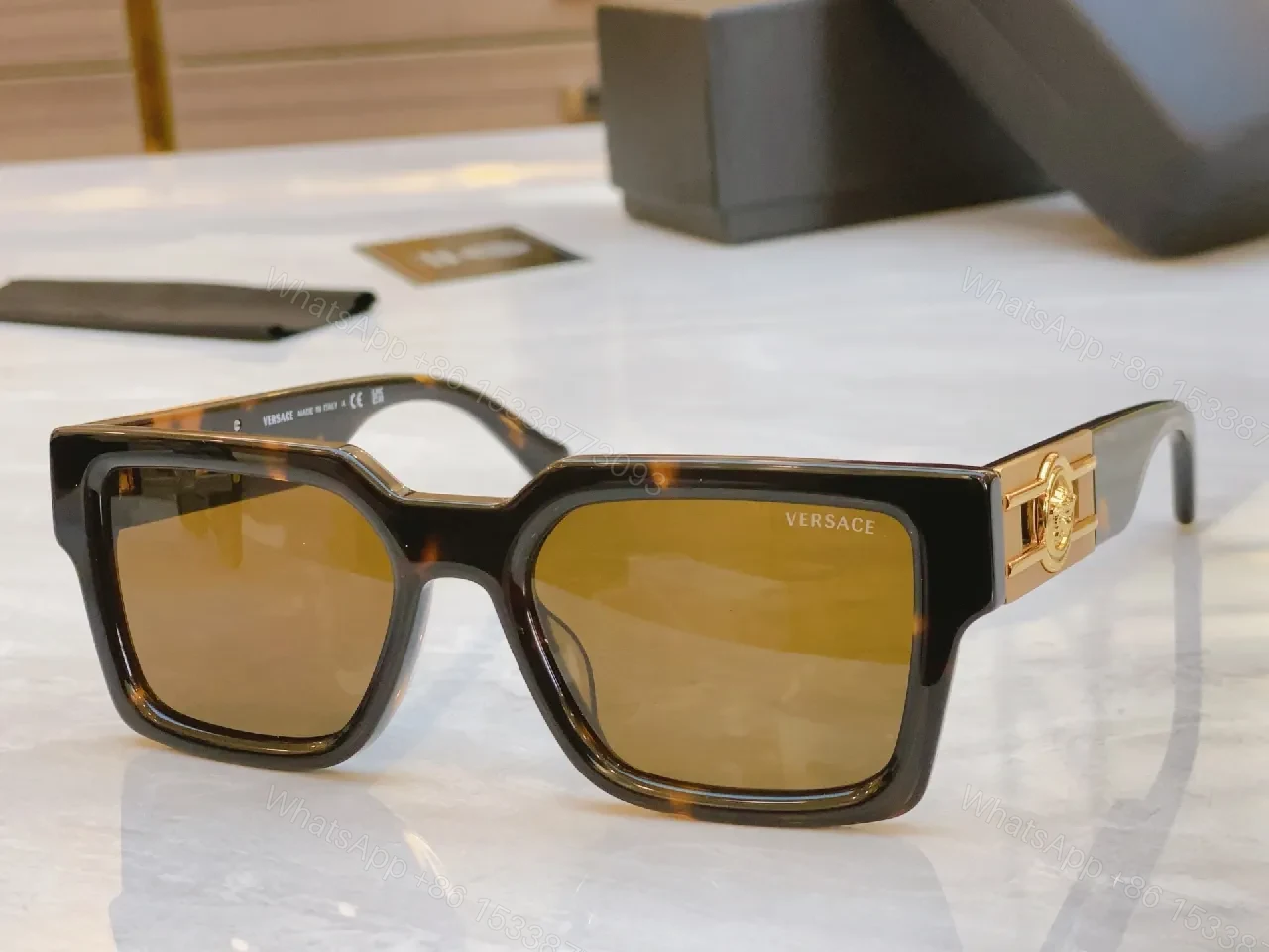 View 2 of Deep Tone Frame Luxe Sunglasses with Signature Hardware
