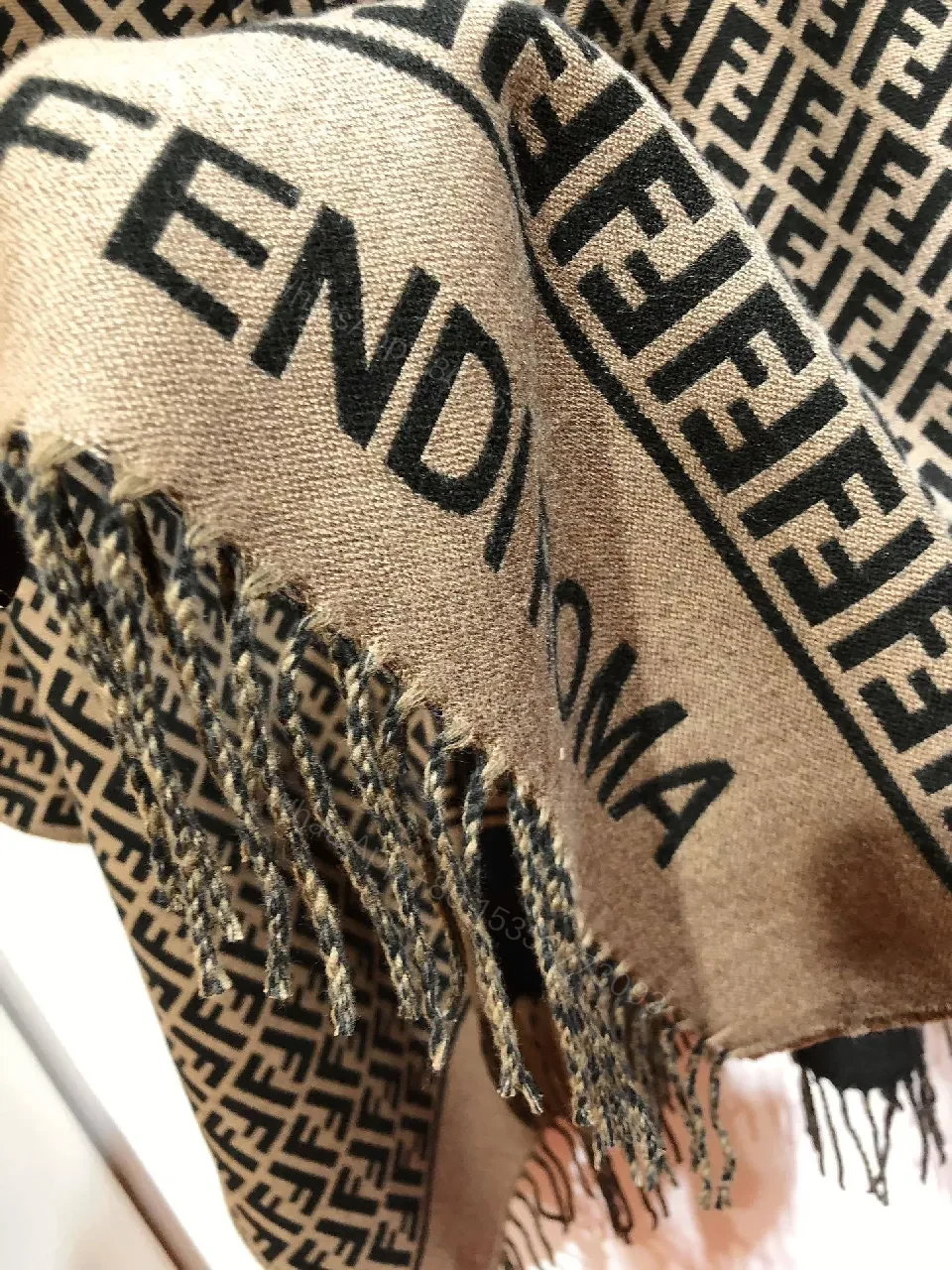 View 9 of Two-Tone Knit Poncho: Luxe Pattern & Soft Fringe