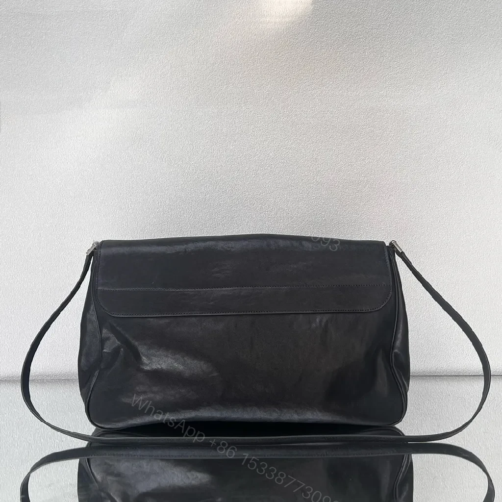 View 9 of Compact Black Leather Crossbody: Subtle Luxe, Minimal Hardware