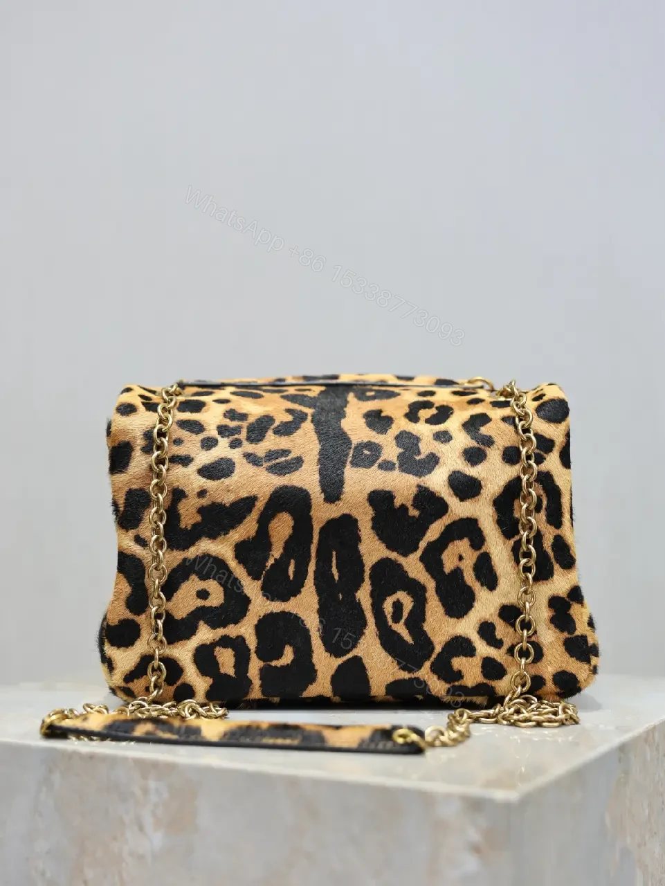 View 2 of Leopard Print Mini Bag with Gold Accent: Compact Luxury Bag