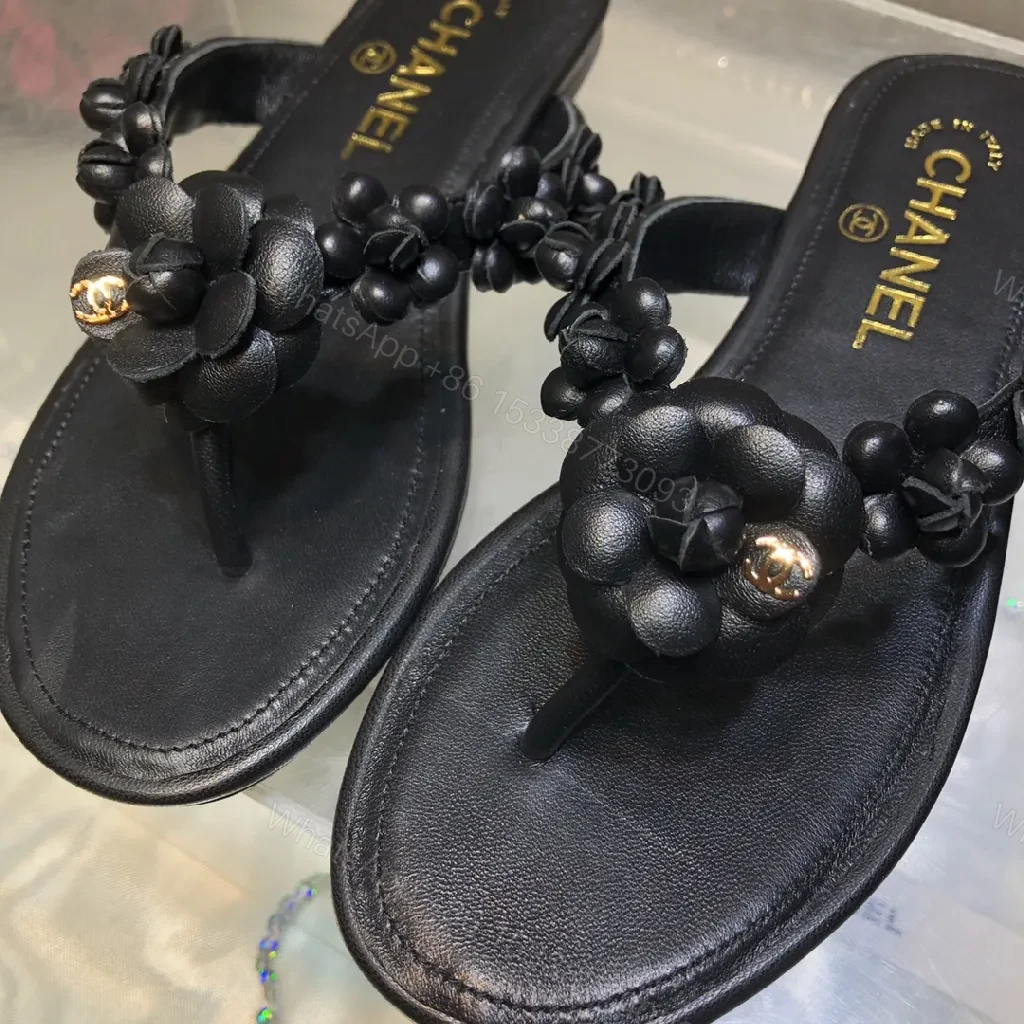 View 8 of Black Leather-Feel Floral Slip-Ons with Luxe Accents