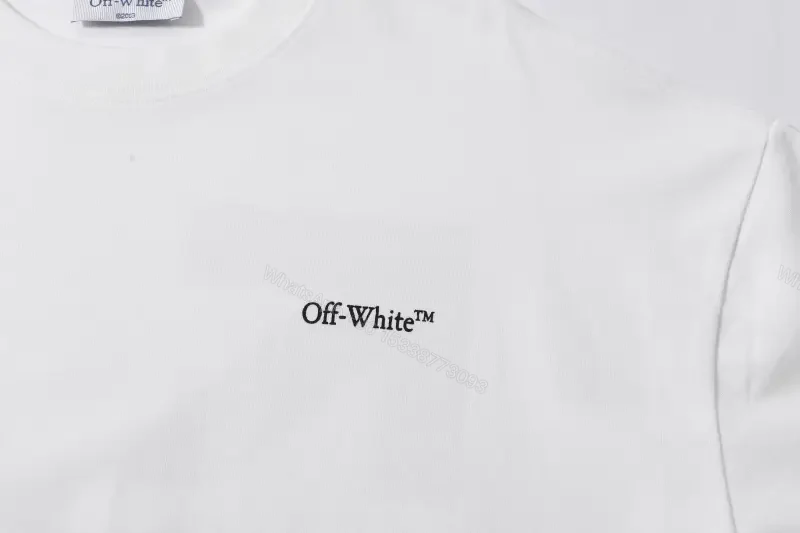 View 11 of Minimalist White Tee: Premium Cotton, Subtle Logo, Everyday Luxury