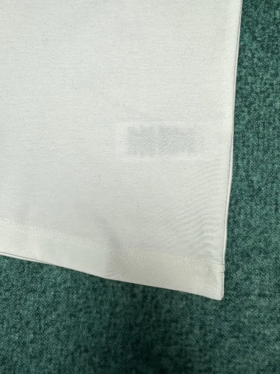 View 4 of White Cotton Tee: Subtle Luxe Script Detail, Premium Comfort, Timeless Fit