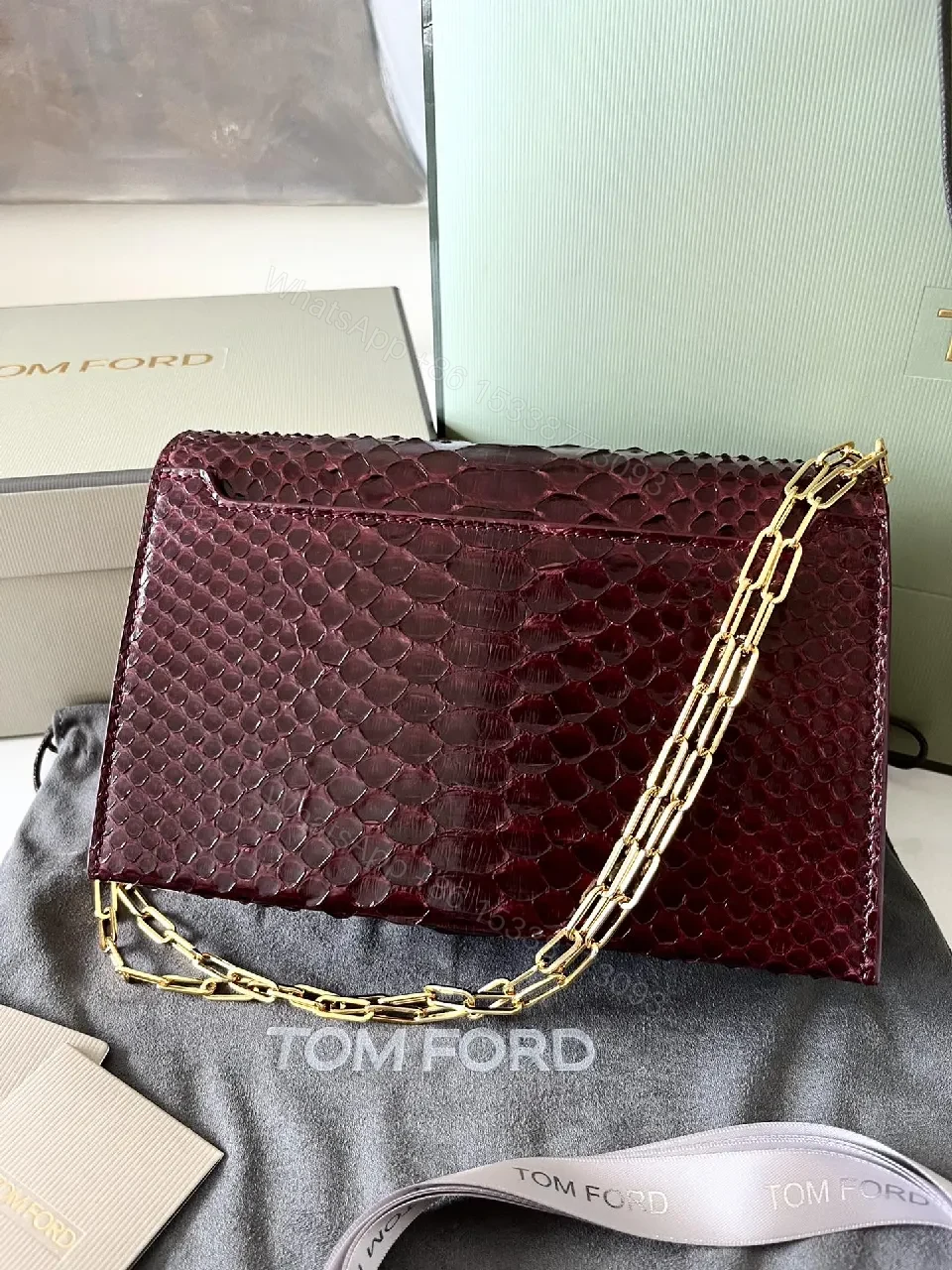 View 3 of Burgundy Python Textured Clutch with TF Gold Hardware